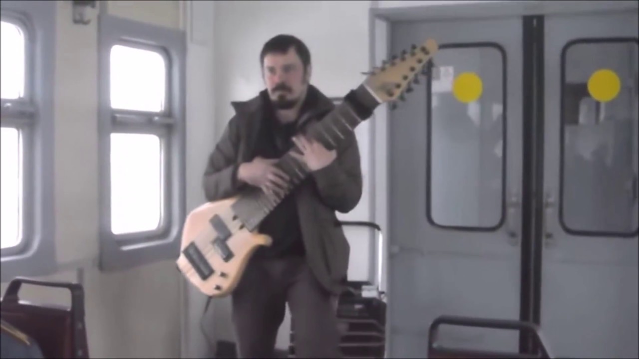 Russian Busker..12 string Bass on a Train.. brilliant
