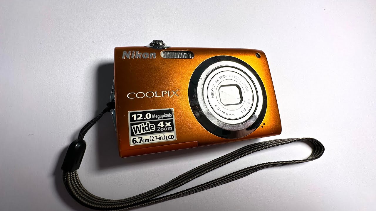 Nikon Coolpix S3000 Orange digital camera 12 Mega Pixels