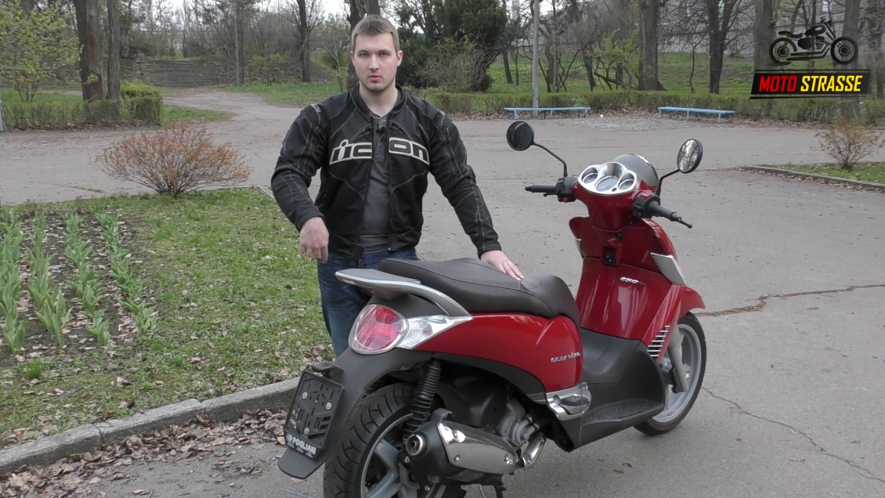 Обзор макси-скутера  Aprilia Scarabeo 250ie ABS (2011)