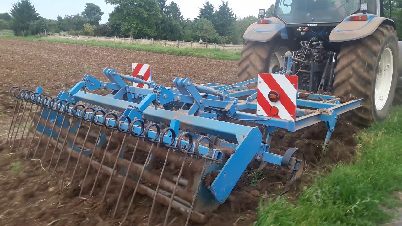 New Holland 8340 / Rabe Grubber