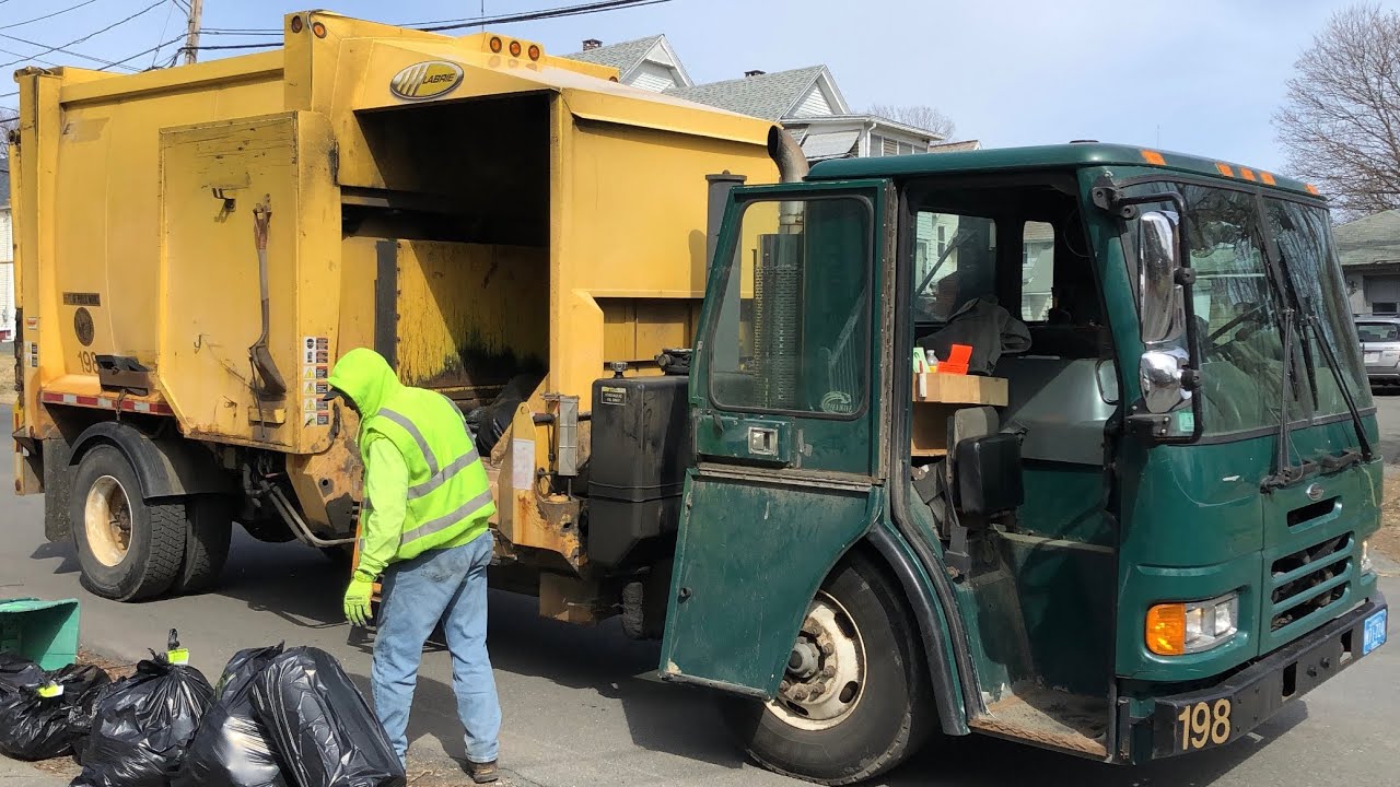 Roaring Sterling Condor Labrie Expert MSL Garbage Truck Packing Trash Bags