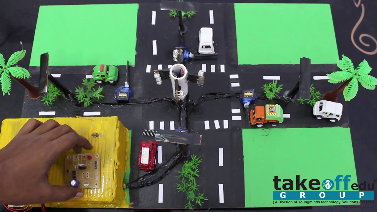 Smart Traffic Light Control System with automatic vehicle speed braker