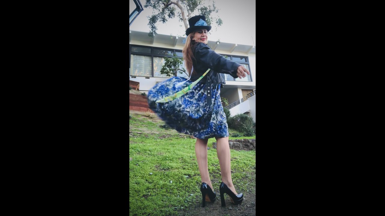 Windy day with jacket and famous blue rose dress