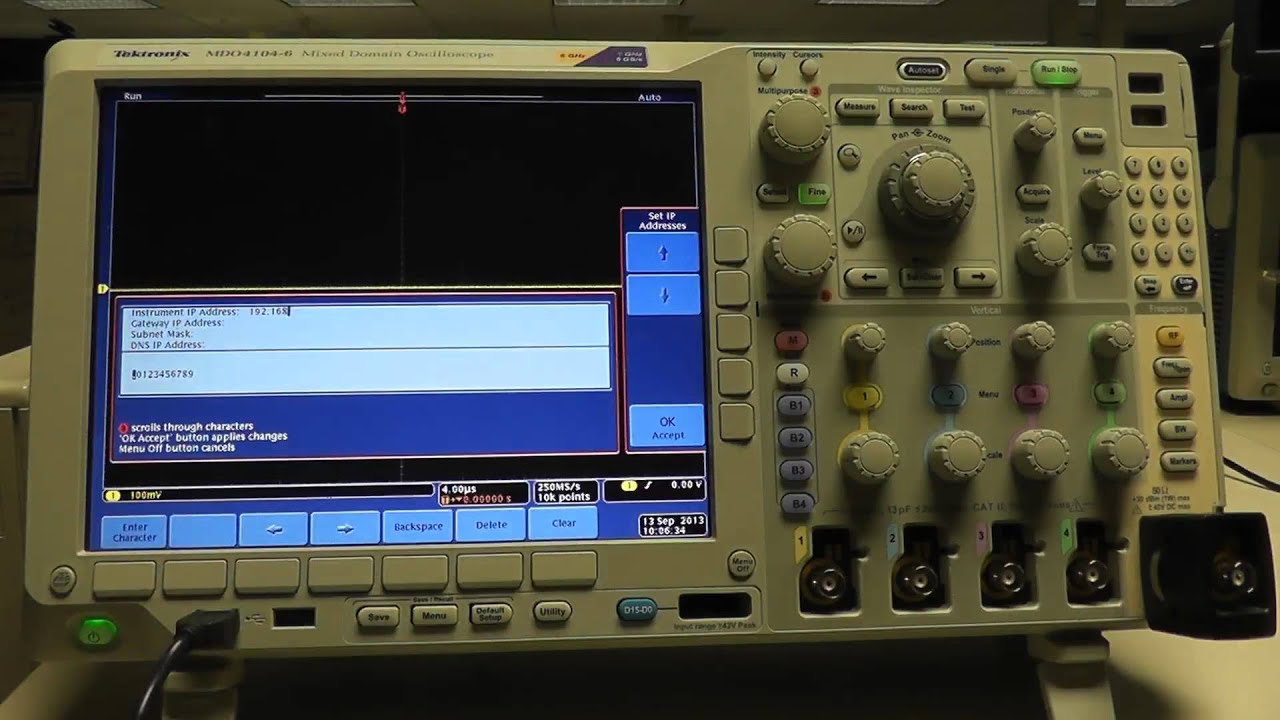 How do I configure the LAN Settings on an MDO4000 series oscilloscope?