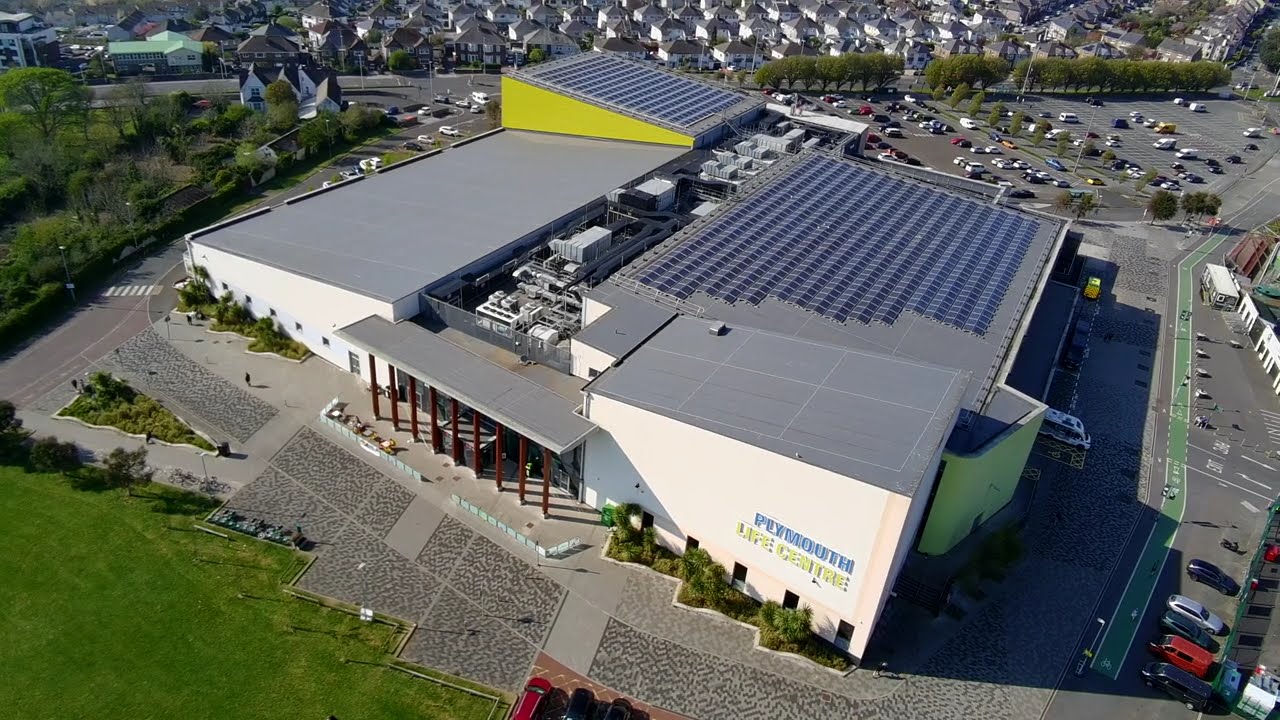 Soaring over Central Park Plymouth UK: Drone Footage - Life Centre and Argyle's Home Park Stadium