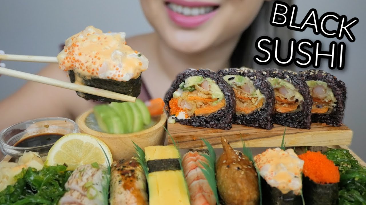 BLACK SUSHI *Jumbo Deluxe Dynamite Roll with Assorted black rice nigiris & Avocado Sunomono Salad