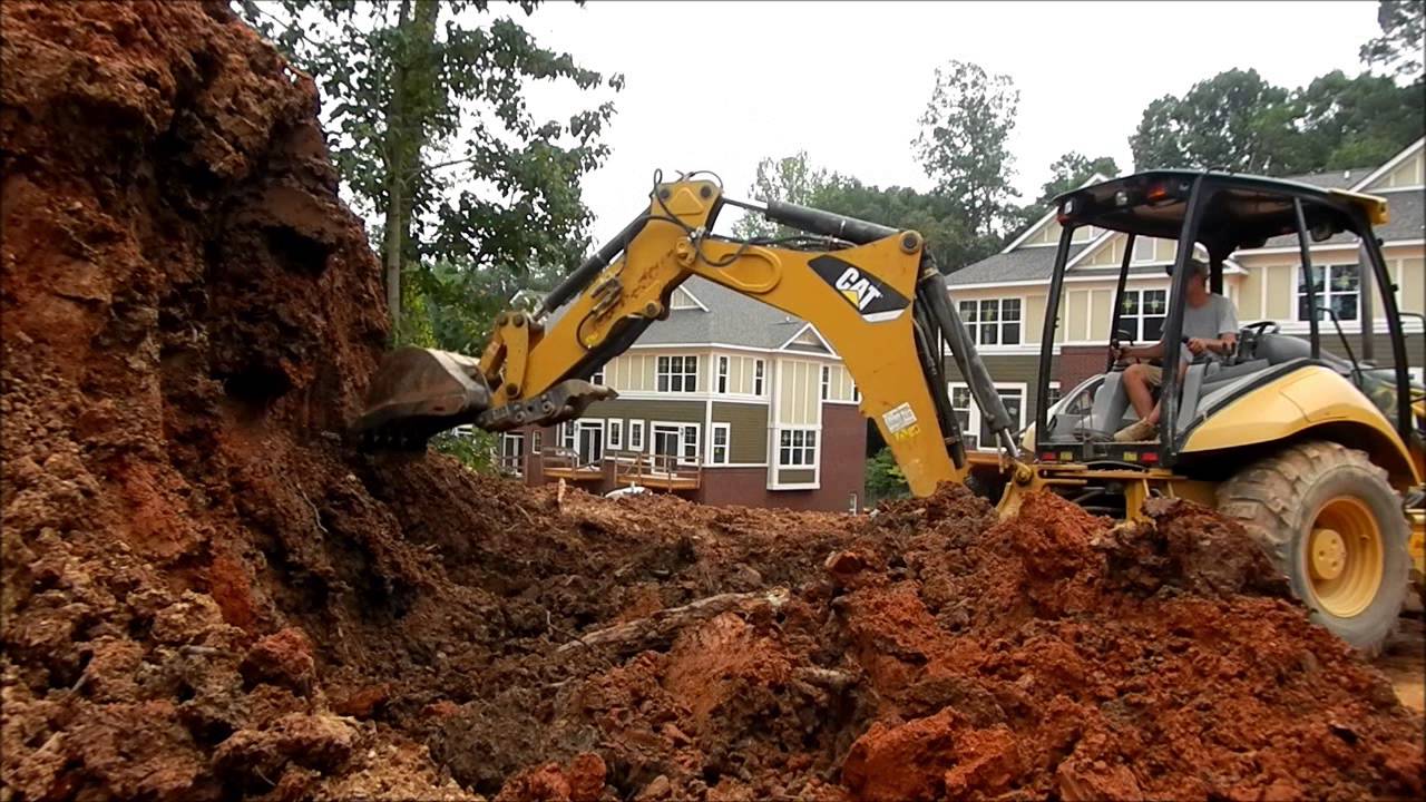 Cat 420E Backhoe Digging