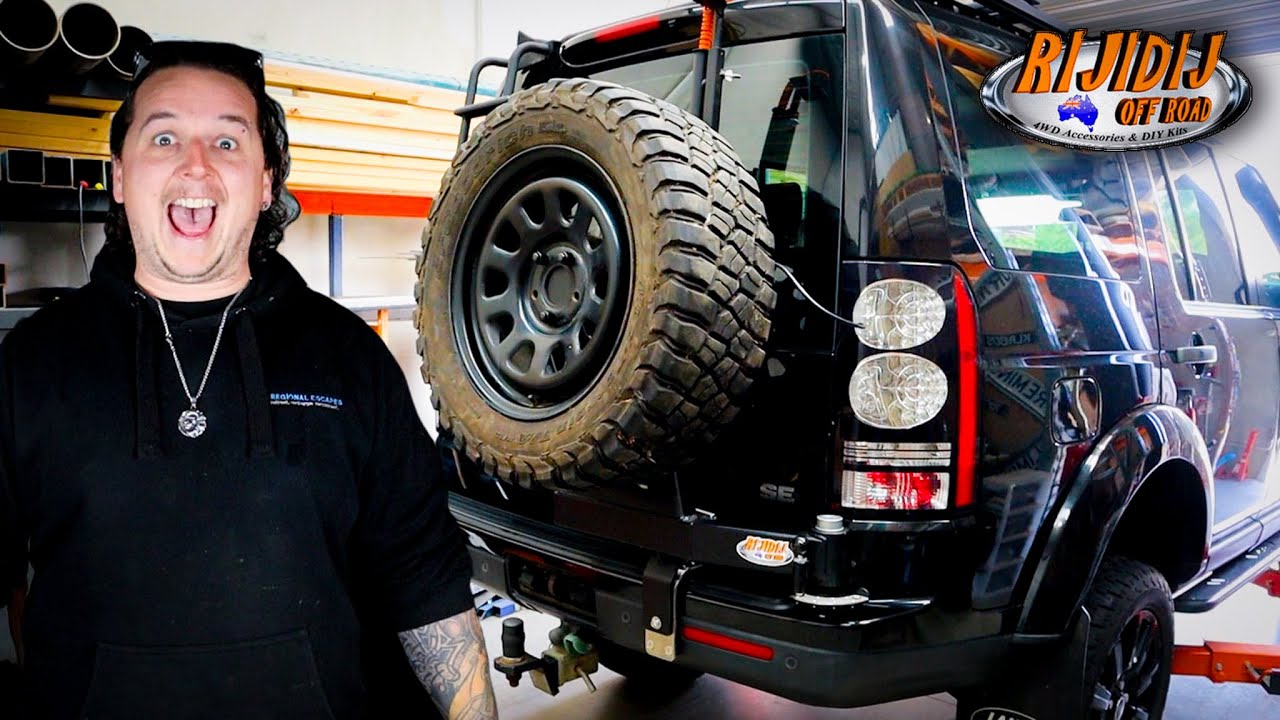 Установка держателя запасного колеса — Land Rover Discovery 4