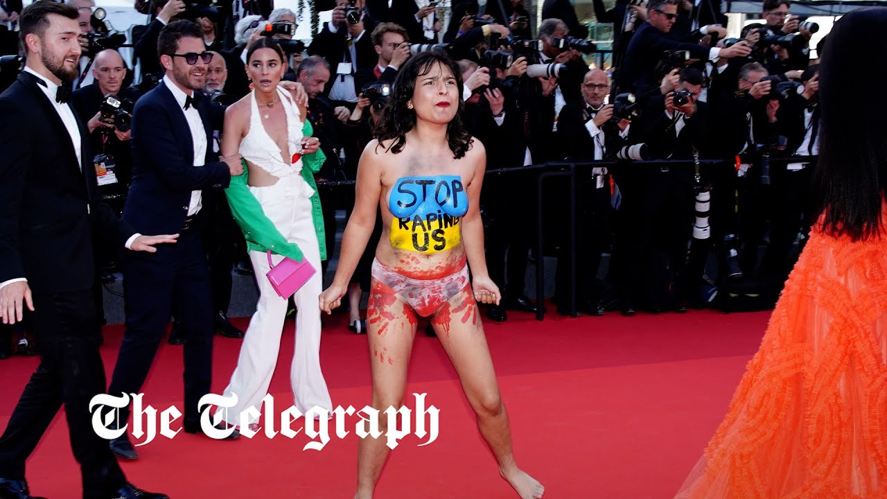 Semi-naked Ukraine protesters storms Cannes red carpet