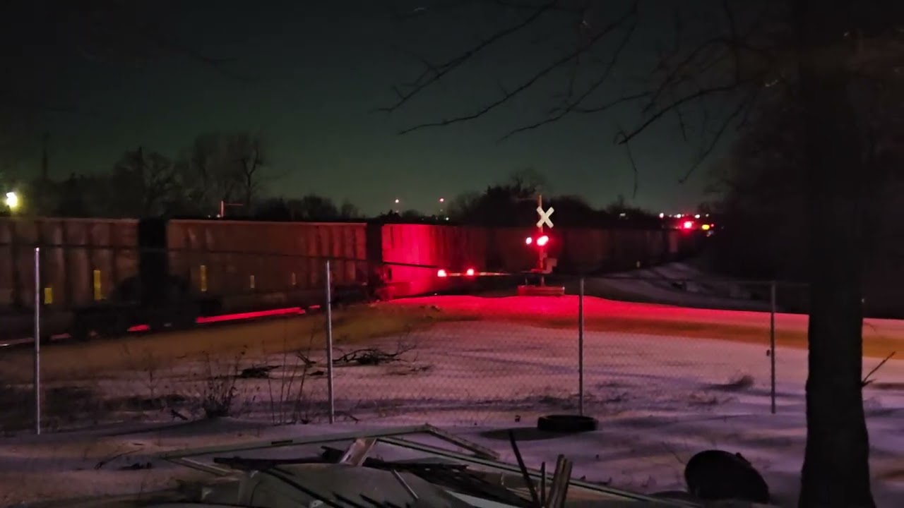 UP 6465 leads a coal train at the Riverview RV in Colbert Oklahoma towards the Red River Bridge 