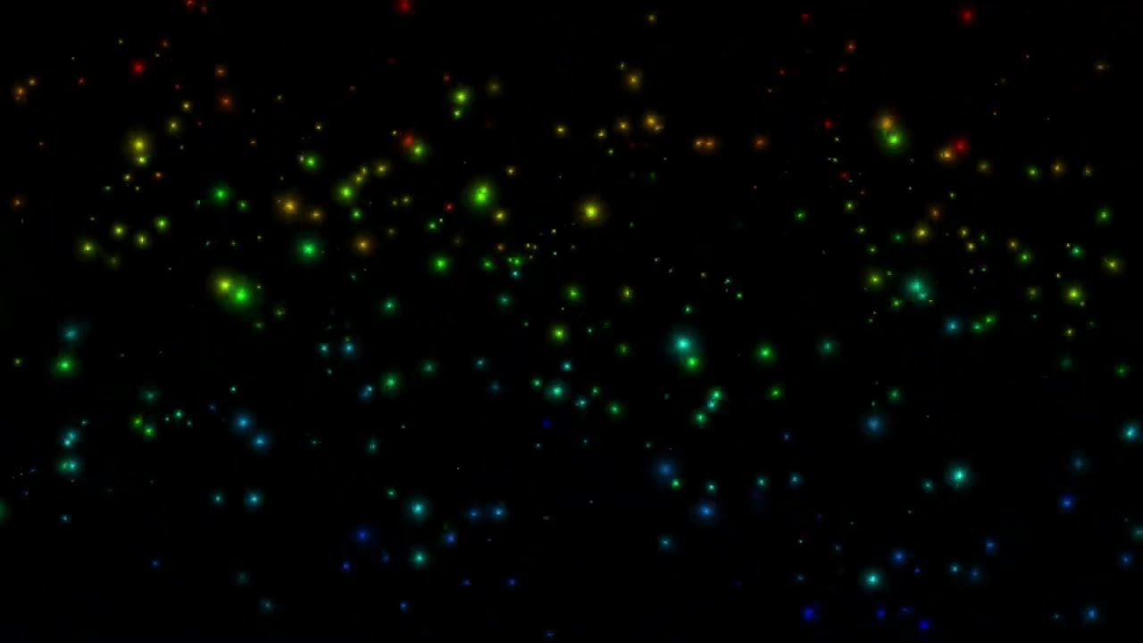 Colored Glittering Particles on a Black Screen Background Video HD