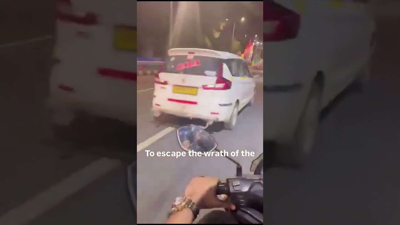 Man hangs for his life on Car bonnet in Mumbai 🤦‍♂️.  