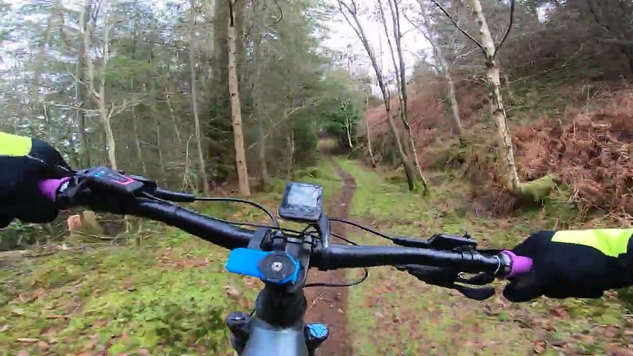 Old man on a hardtail EMTB at mabie forest red trail 