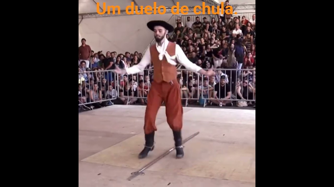 Dança sepateada, com muita cordenaçao ritmo e equilíbrio. Dança  gaucha.origem dos tropeiros.