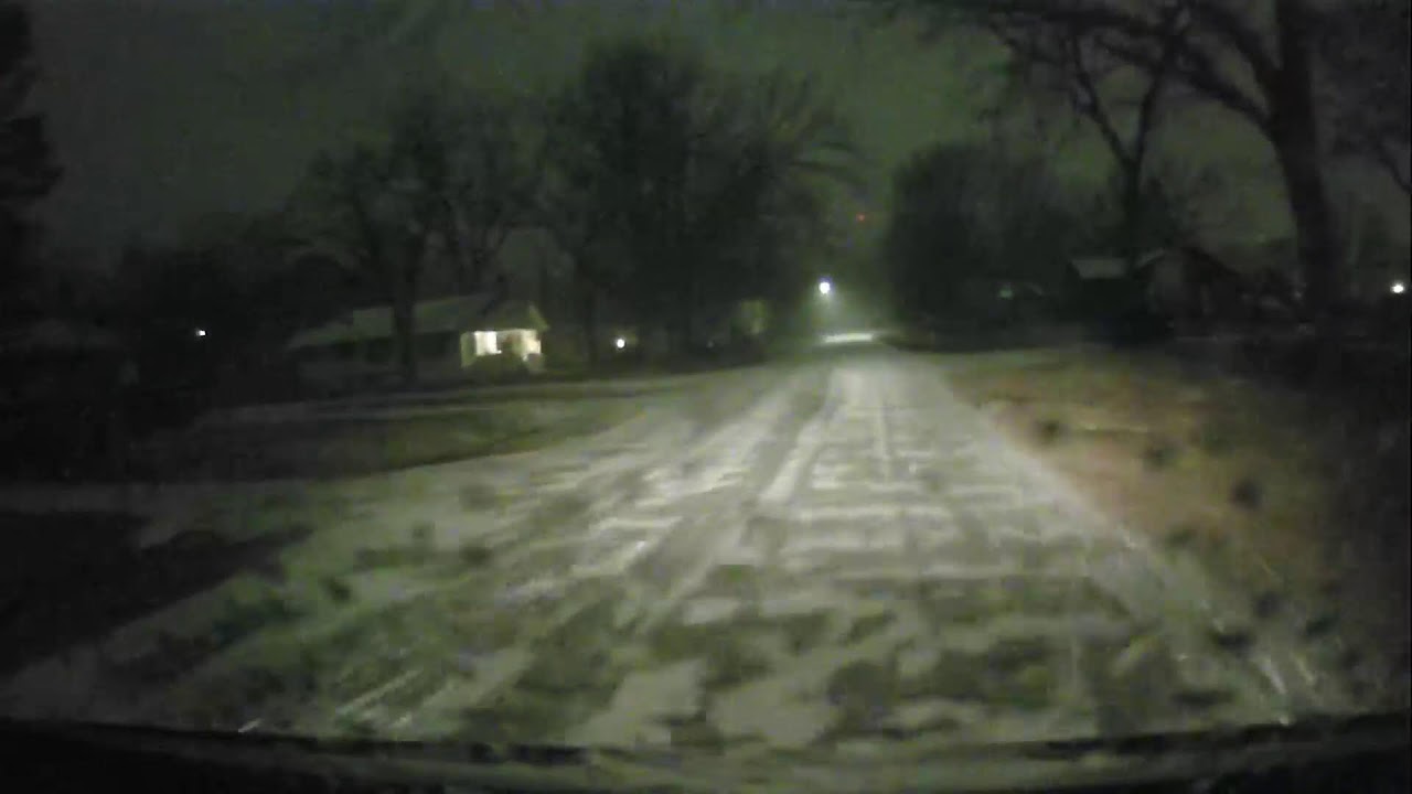 Ranger 8 on the road as snow falls across Green Country