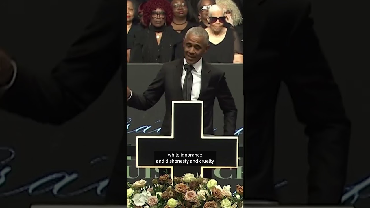 Obama says democracy under 'assault' at Jesse Jackson memorial