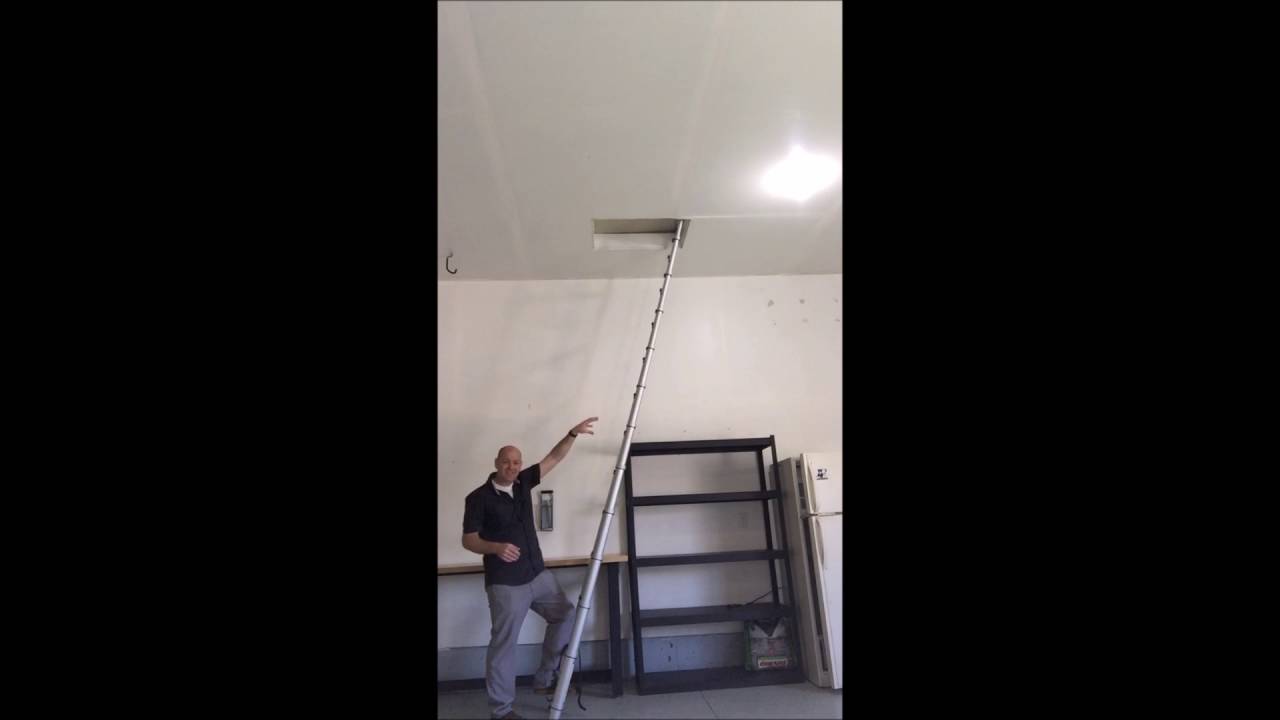 Using Your Ladder to Open the Attic Scuttle