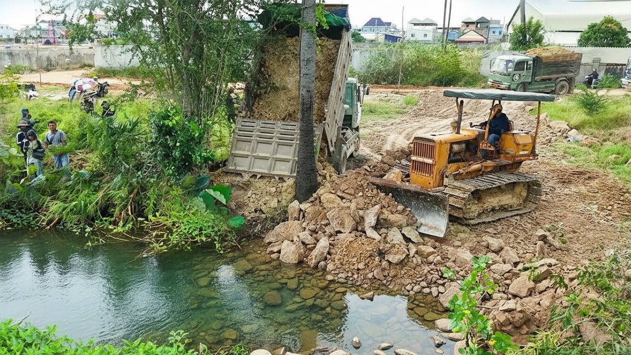 Powerful Start! D31P Dozer Pushes Soil into a Large Pond
