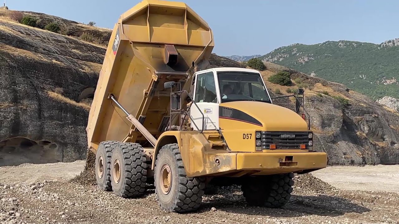 Caterpillar 374D Excavator Loading Caterpillar 730 & 740 Articulated Trucks - Interkat SA