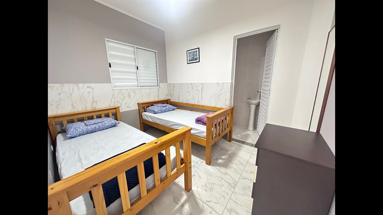 Casa geminada em Praia Grande (Sítio do Campo): 2 quartos, 2 vagas, 95 m² interna. Venda R$ 380.000