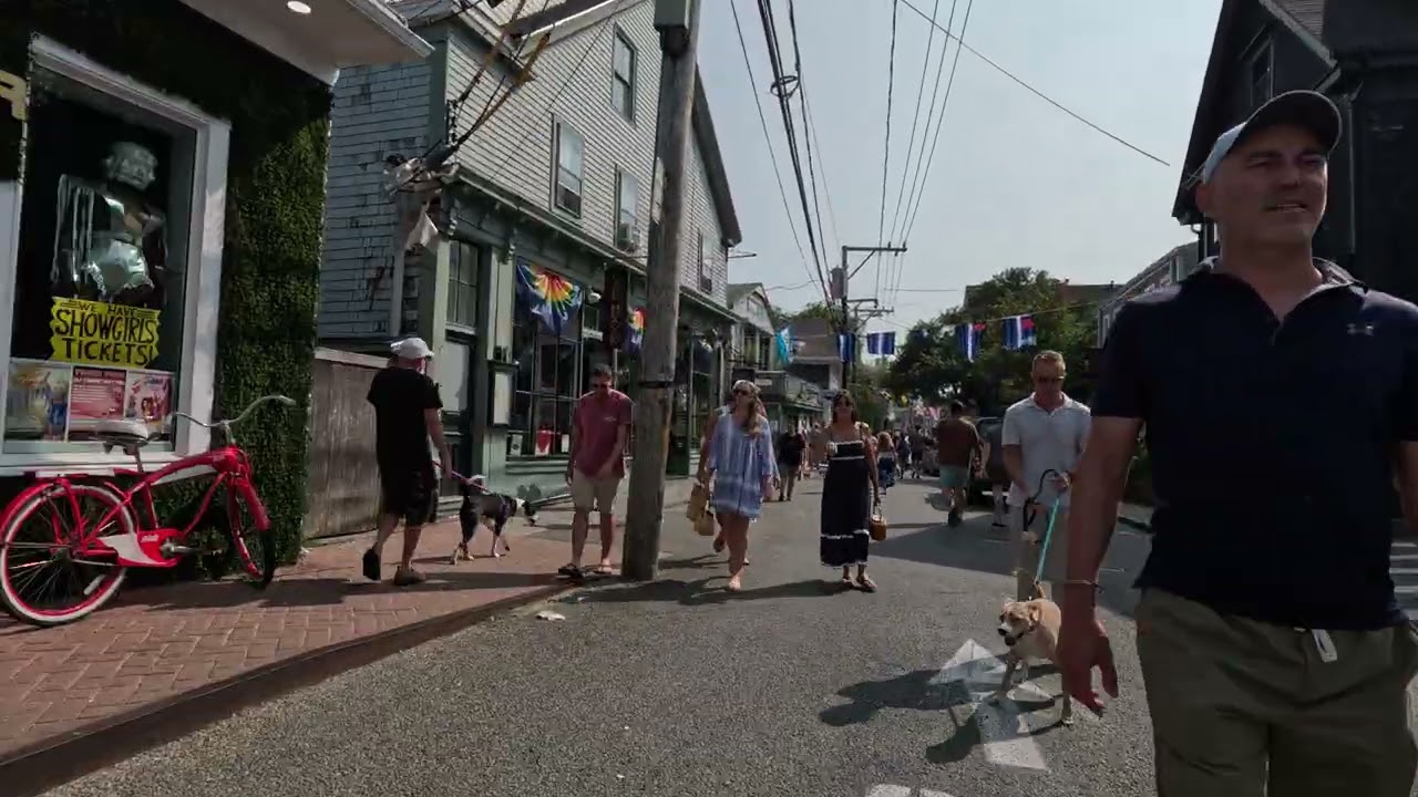 Walking down Commercial Street in Provincetown from The Crown & Anchor toward the Boat Slip