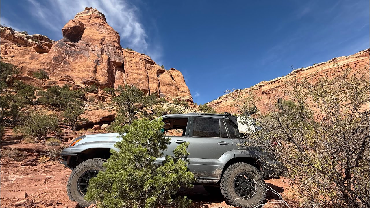 GX470 on 34s with Friends on Four Arches at Gemini Bridges in Moab Utah  