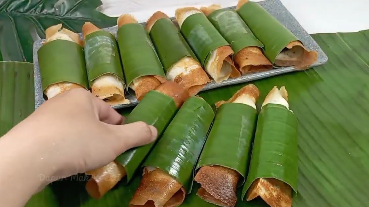 SUDAH JARANG DITEMUI MAKANAN TRADISIONAL DARI OLAHAN TEPUNG BERAS DAN DAUN PISANG INI