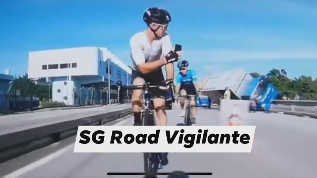 27dec2020 yishun dam cyclist use of mobile device while riding and rear end parked car