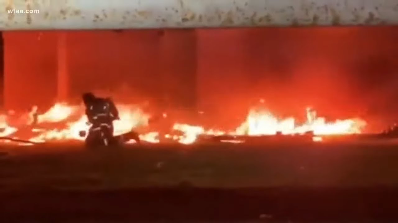 Video shows Dallas firefighter injured by falling debris