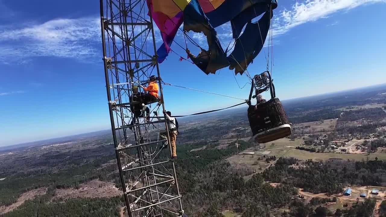 WATCH: New close-up drone video shows moment pulled balloon riders from tower over 900 feet up