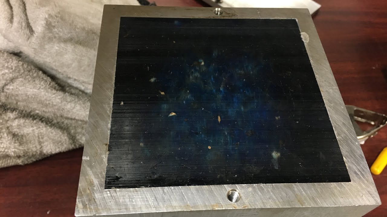 Recycling acrylic scrap using an oven and a hydraulic press
