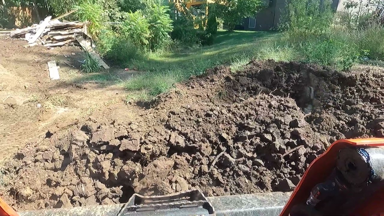Rough Grading A Yard With The Kubota SVL75-2