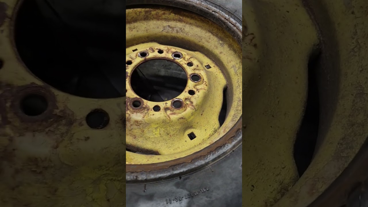 Tubing up an old John Deere tire! #farmer #fyp 