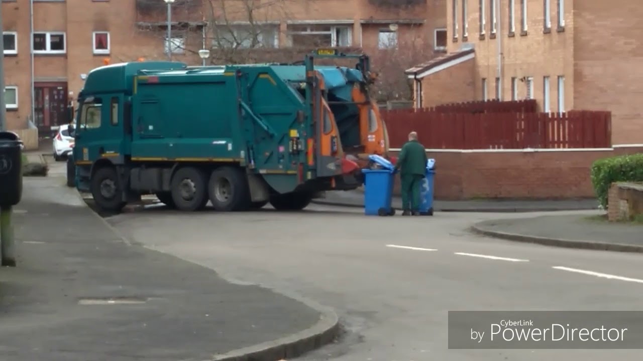 Heil powerlink with terberg lifters collecting recycling