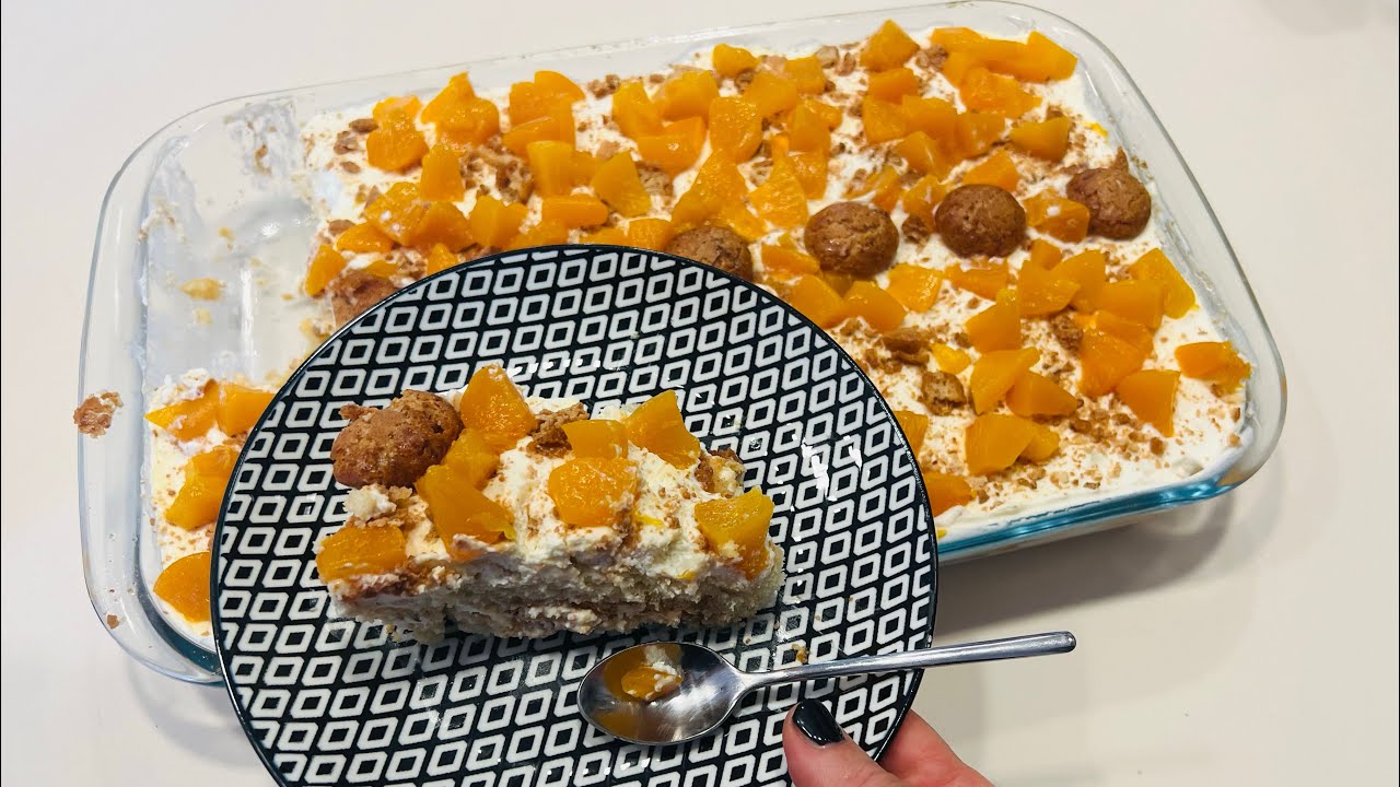 Tiramisù con pesche sciroppate e amaretti senza uova. Leggero, fresco,delizioso dal sapore unico!