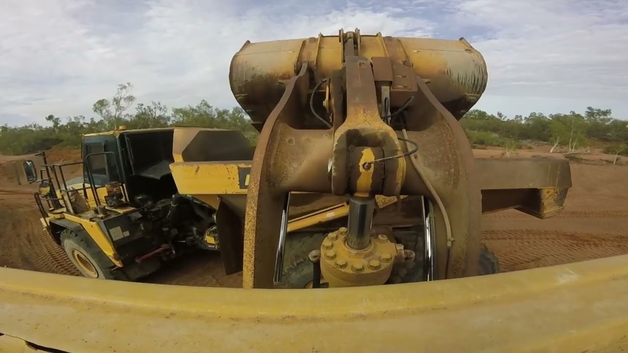 #pov #gopro #birdseyeview  from #frontendloader roof of #operator loading #dumptruck in #quarry