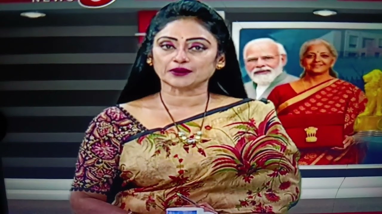 Beautiful Newsreader Kalyani in Brown Saree 