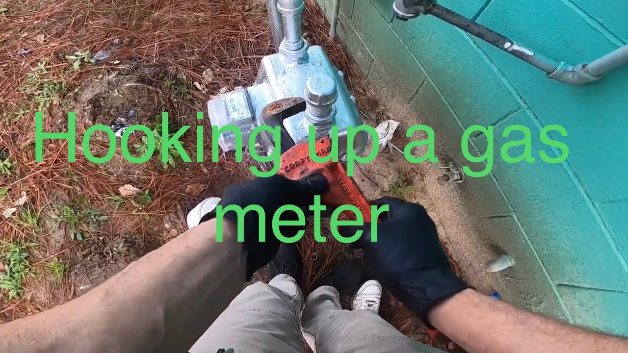 Hooking up a new gas meter to the house.