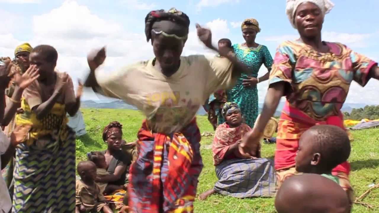 Pygmies dancing and welcoming guests (The Forgotten Parks)