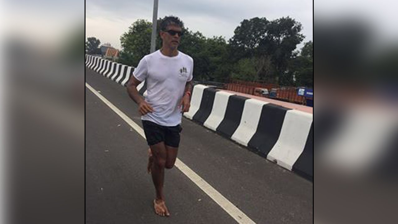 Milind Soman running barefoot from Ahmedabad to Mumbai, Know why| Oneindia News