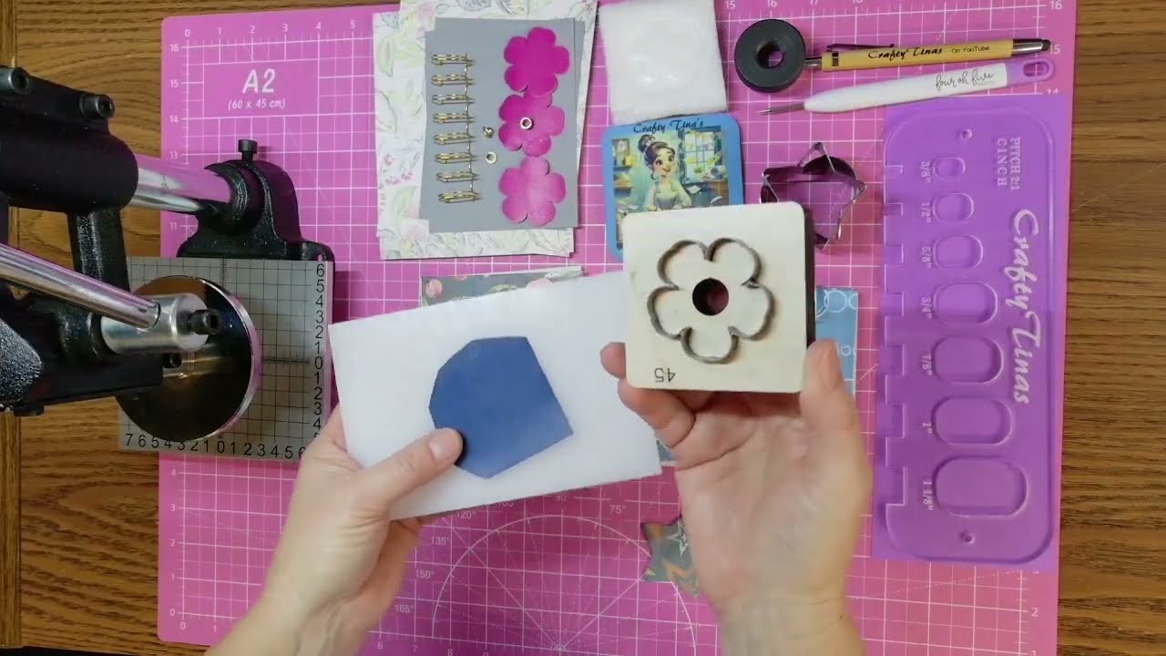 Add leather accents to Cinch bound notebooks.  We R Memory. Leather Punch press.3D embellishments.