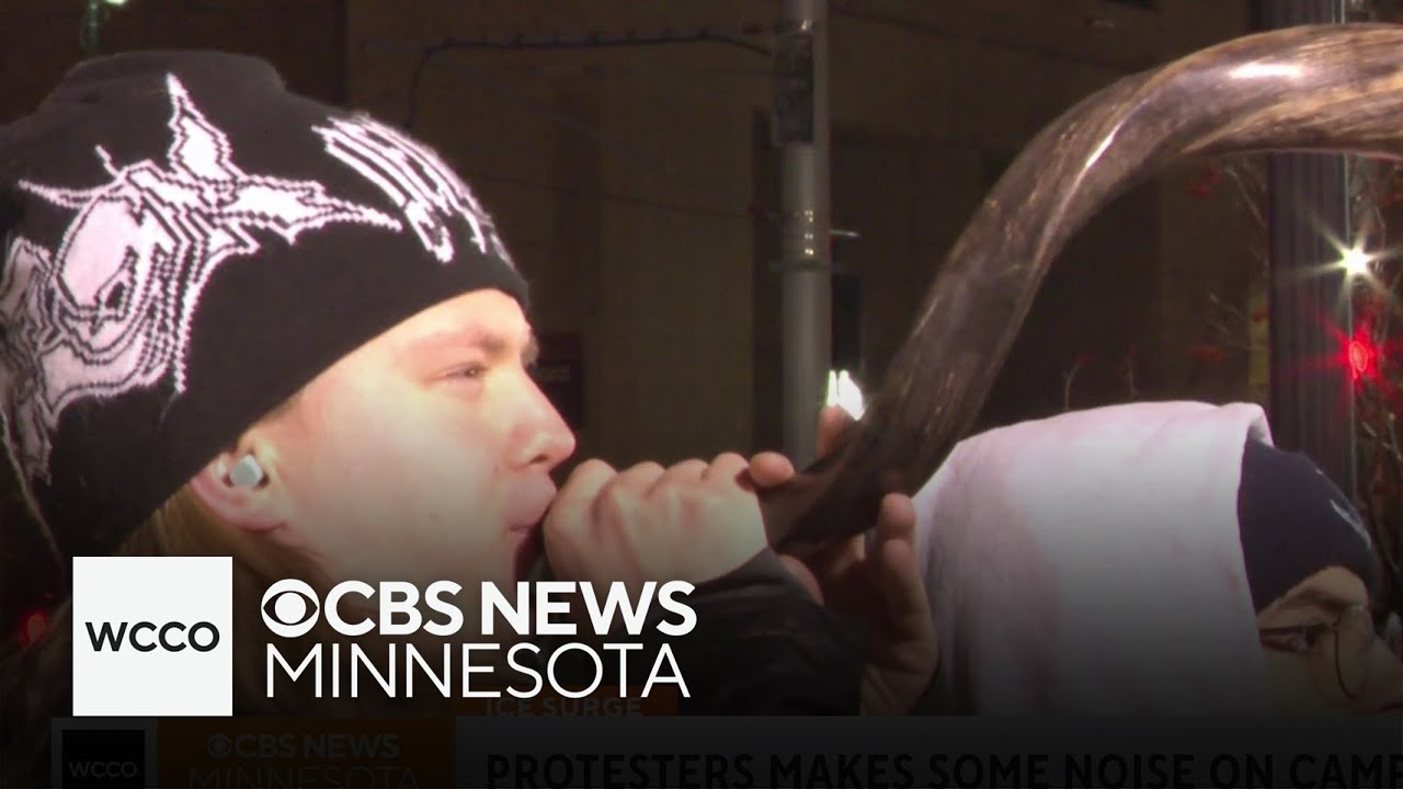 Anti-ICE protesters face off with police outside hotel in Minneapolis