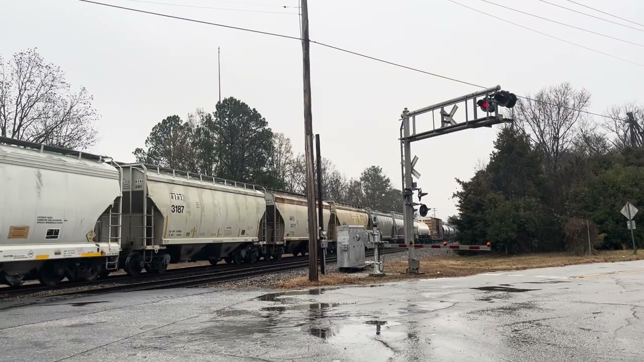 CSX 1982 ( SBD heritage ) leading M582 into Greenwood w/ 31 y/o CW44AC on 12-18-25