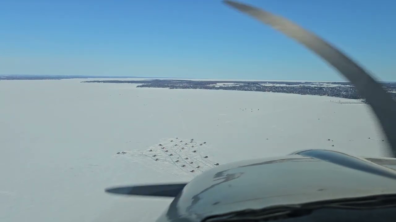 Flying over fishing shacks on Cook's Bay in a Mooney M20J on March 1, 2026