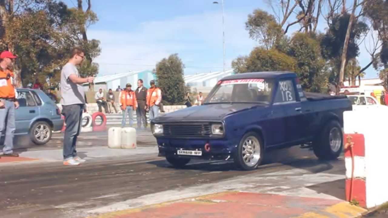 Powershift. Nissan Champ wheelies hard of the start line at Killarney.