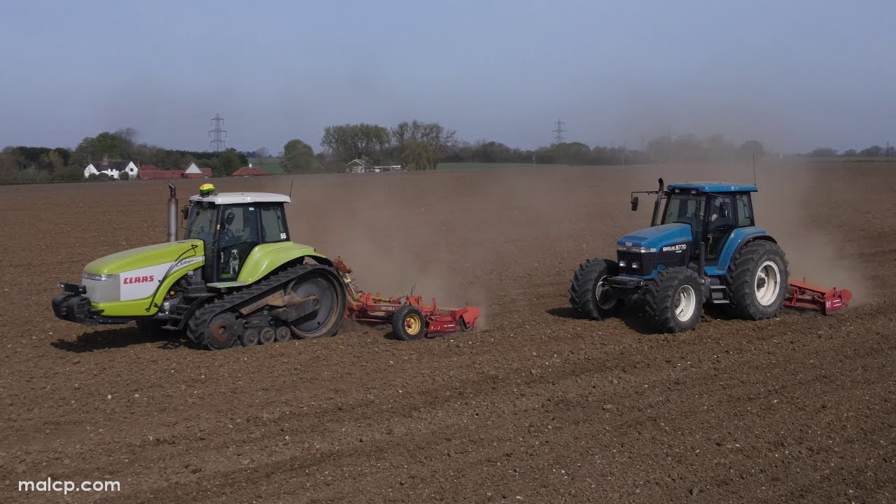 Claas Challenger 55 & Ford New Holland 8770 tractors working with two Lely Terra power harrows