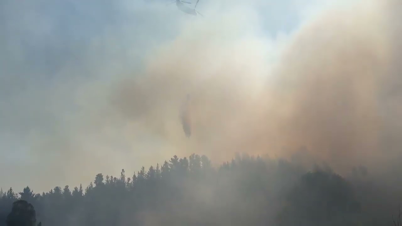Helicopter Douses Water as Wildfires Burn Throughout Chile
