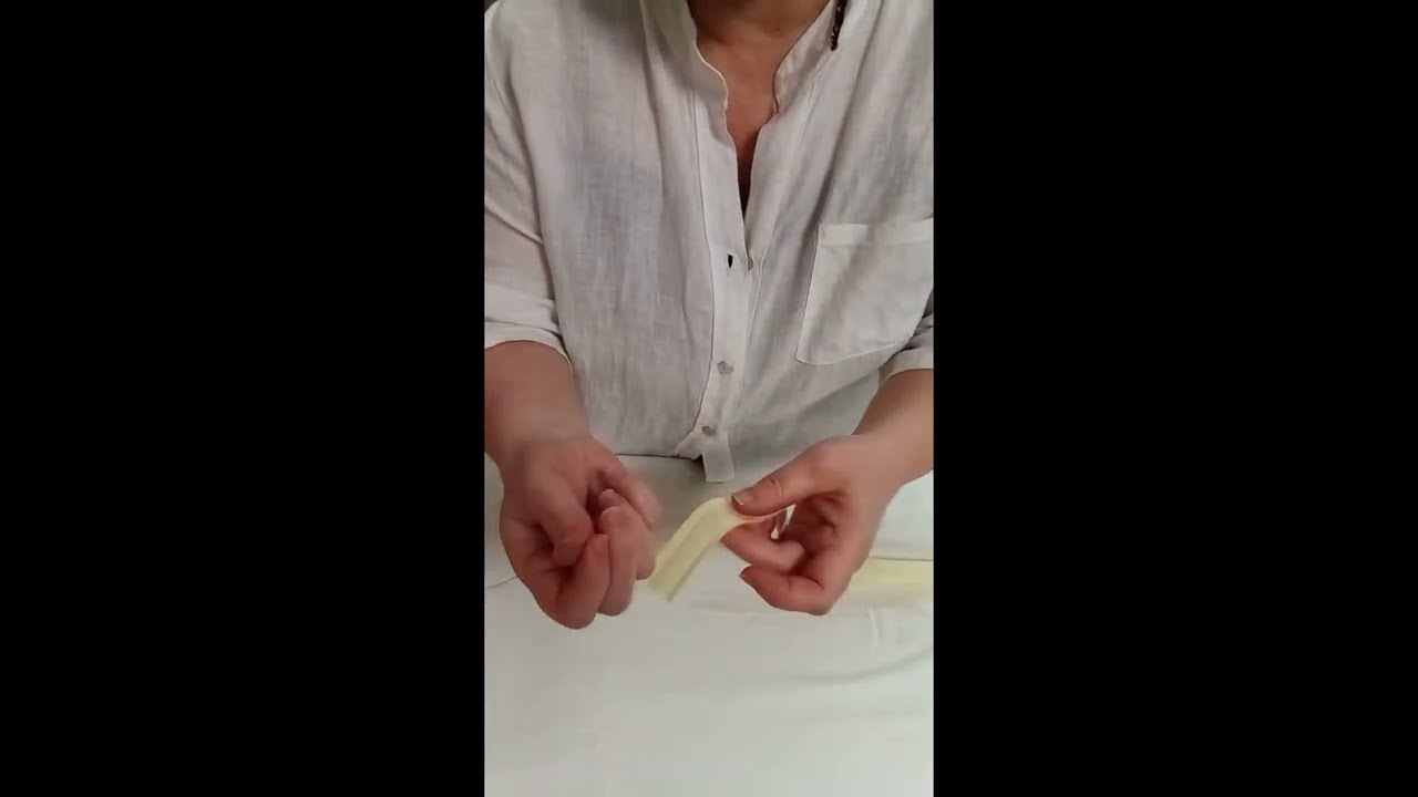 Rivestire il cerchio di ricamo con lo sbieco