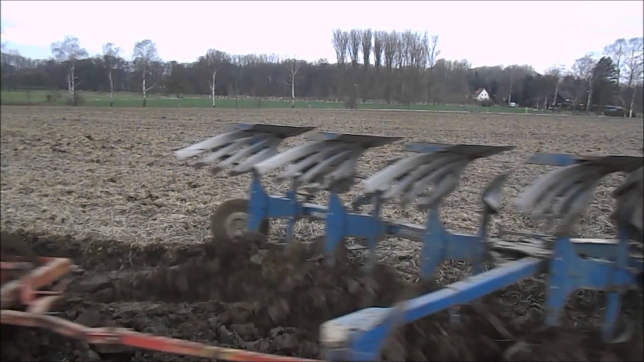 Frühjahr►Pflügen►JD►Mit einem 6920er HIRSCH und Frost Pflug und Packer