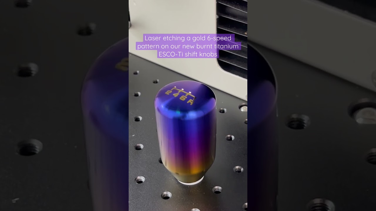 Gold laser etching on our burnt titanium ESCO-Ti shift knobs